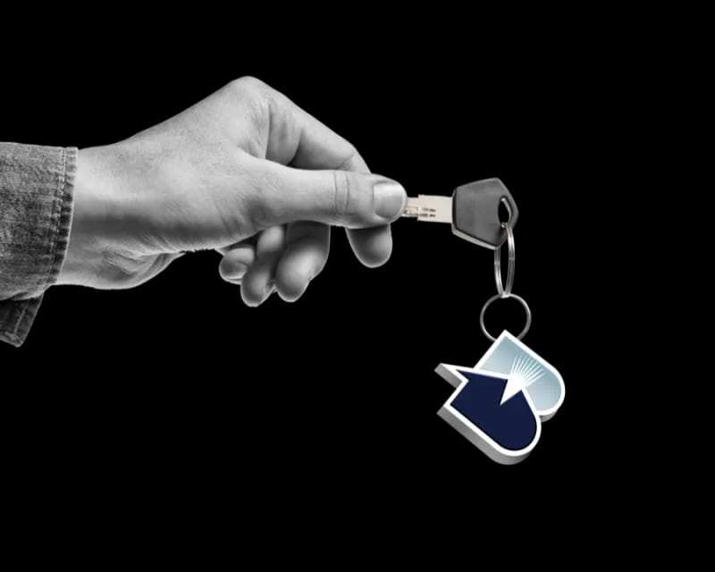 Happy family in front of their new home